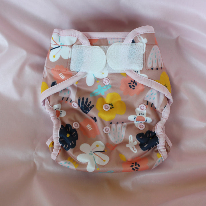 Thiristies natural pocket diaper bloomy on pink