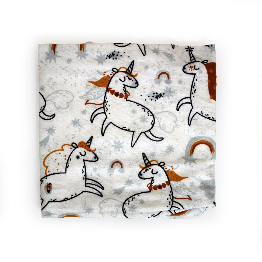 unicorns on white flannel fabric