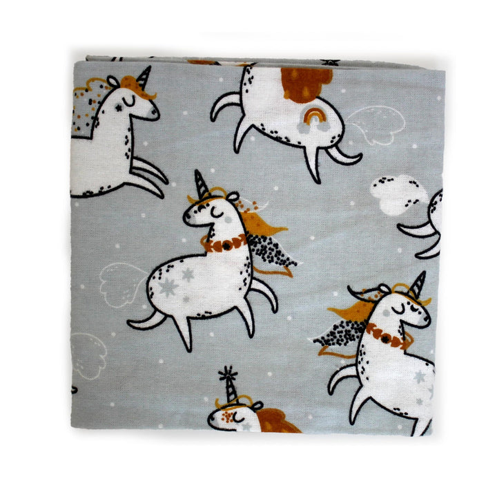 unicorns on grey cotton flannel fabric