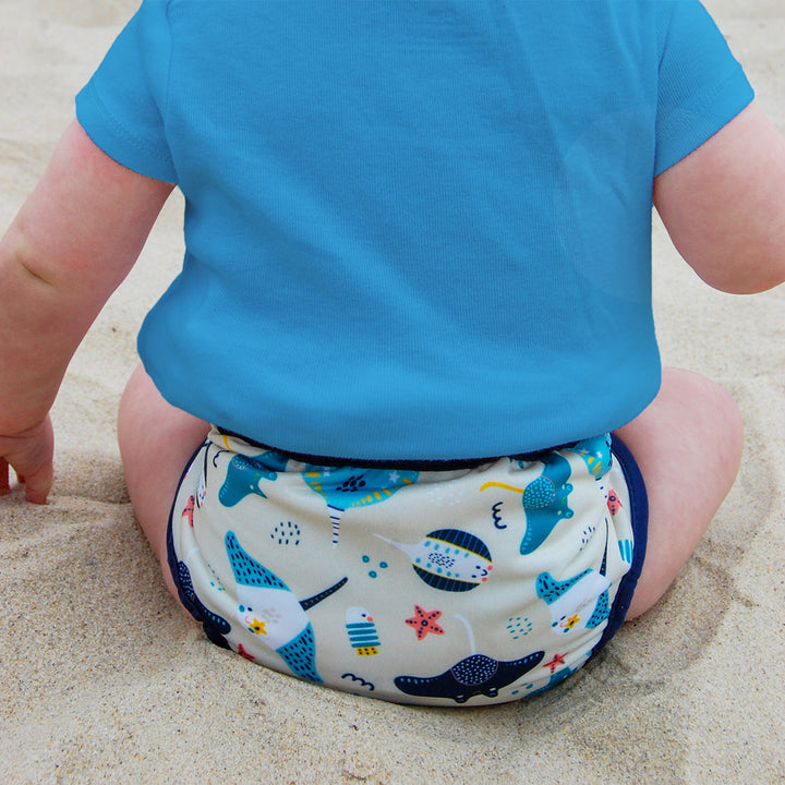 Thirsties swim diaper on a baby