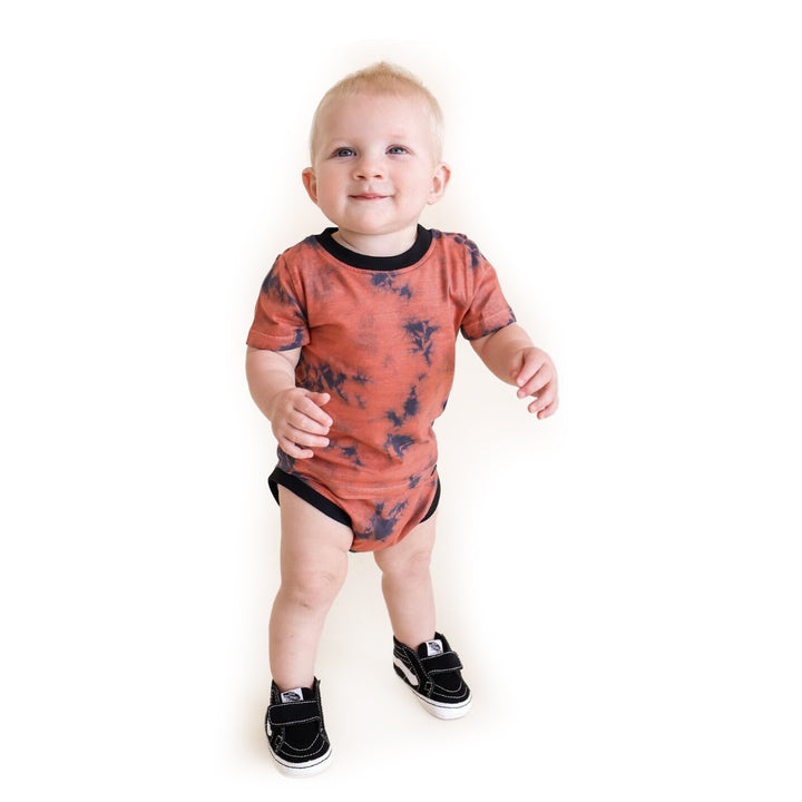 young baby in organic underwear tie dye