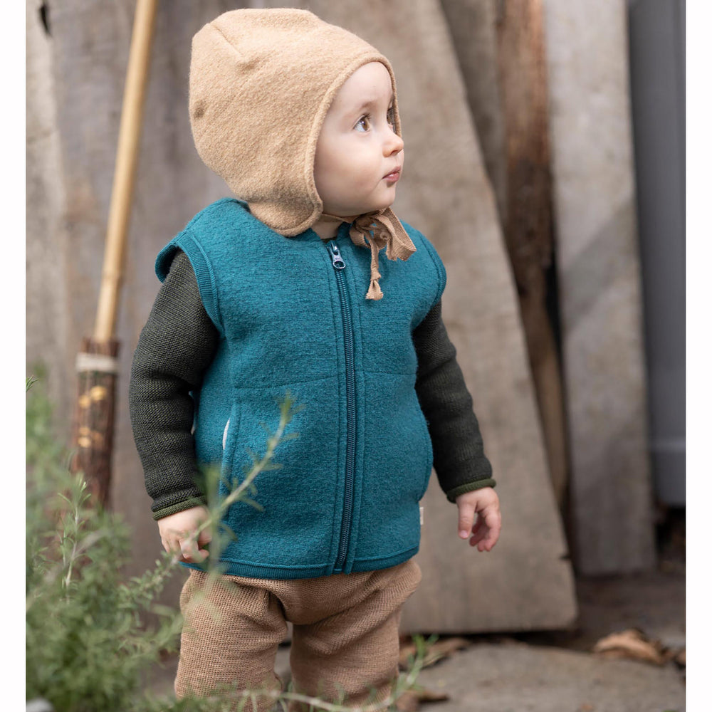 Disana wool vest pacific teal on toddler