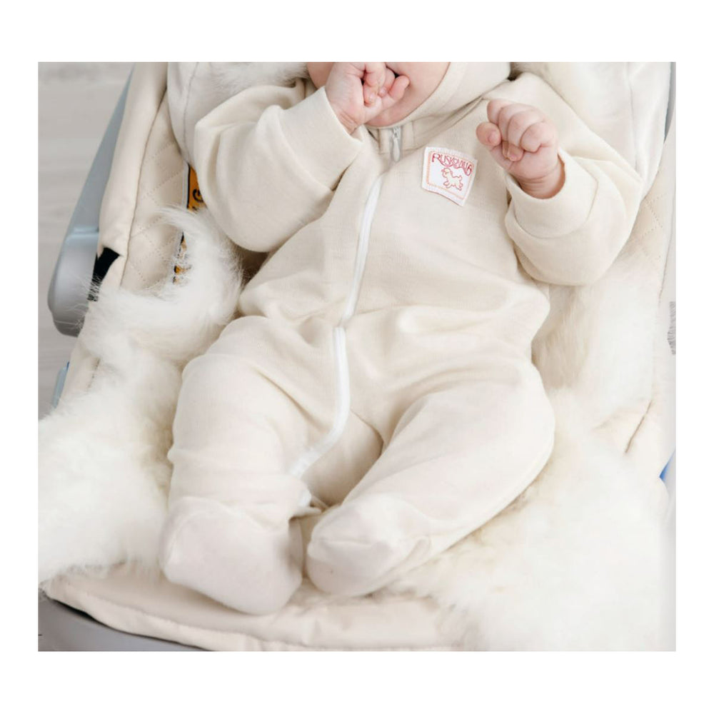 baby in wool zippy sleep and play pajamas